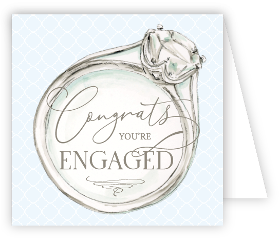 Card with an illustration of a diamond ring and 'Congrats, you're engaged' text on a light blue background. Available at Be Charmed