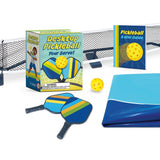 Desktop pickleball set with paddle, balls, and net on a white background. Available at Be Charmed