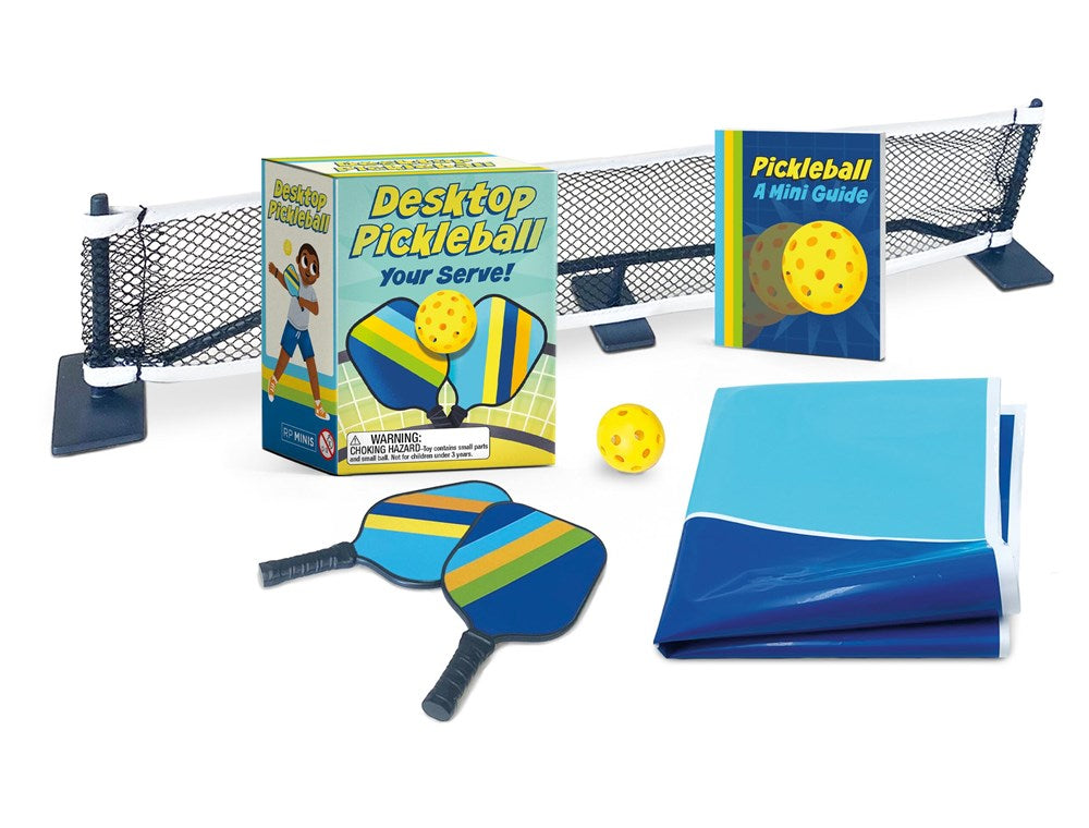 Desktop pickleball set with paddle, balls, and net on a white background. Available at Be Charmed