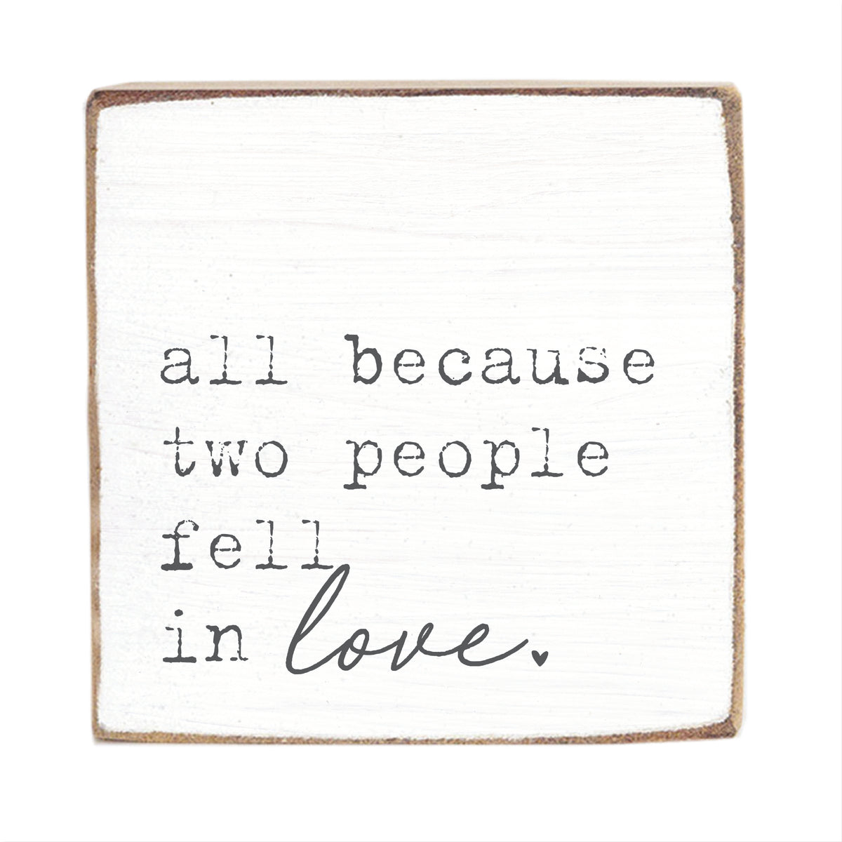 Square block with text 'all because two people fell in love.' on a white background. Available at Be Charmed