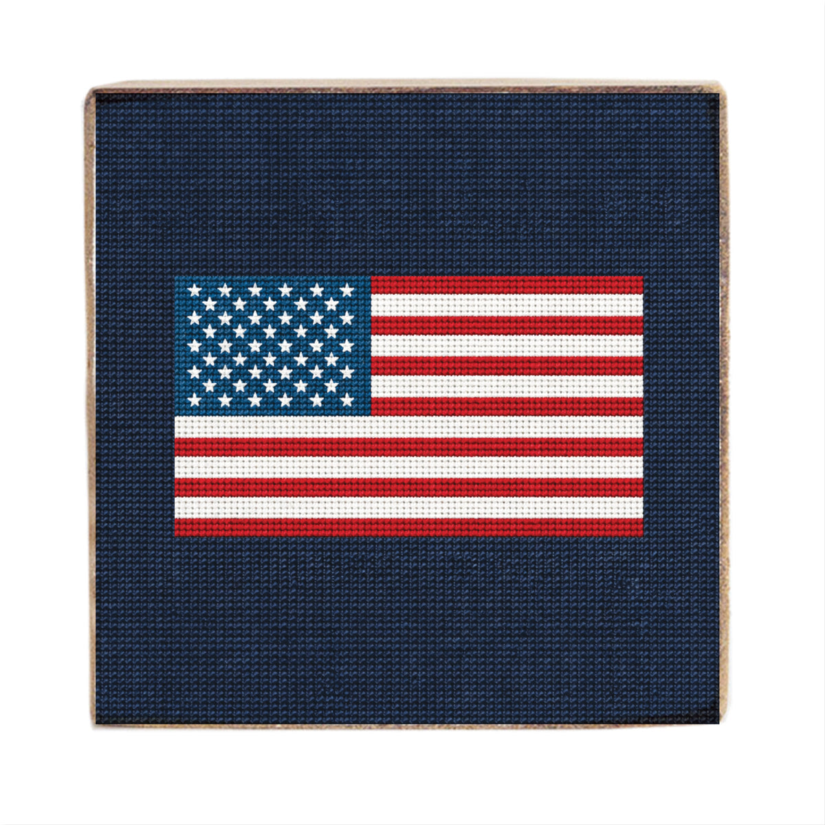 Wooden American flag cross-stitched style on navy. Available at Be Charmed
