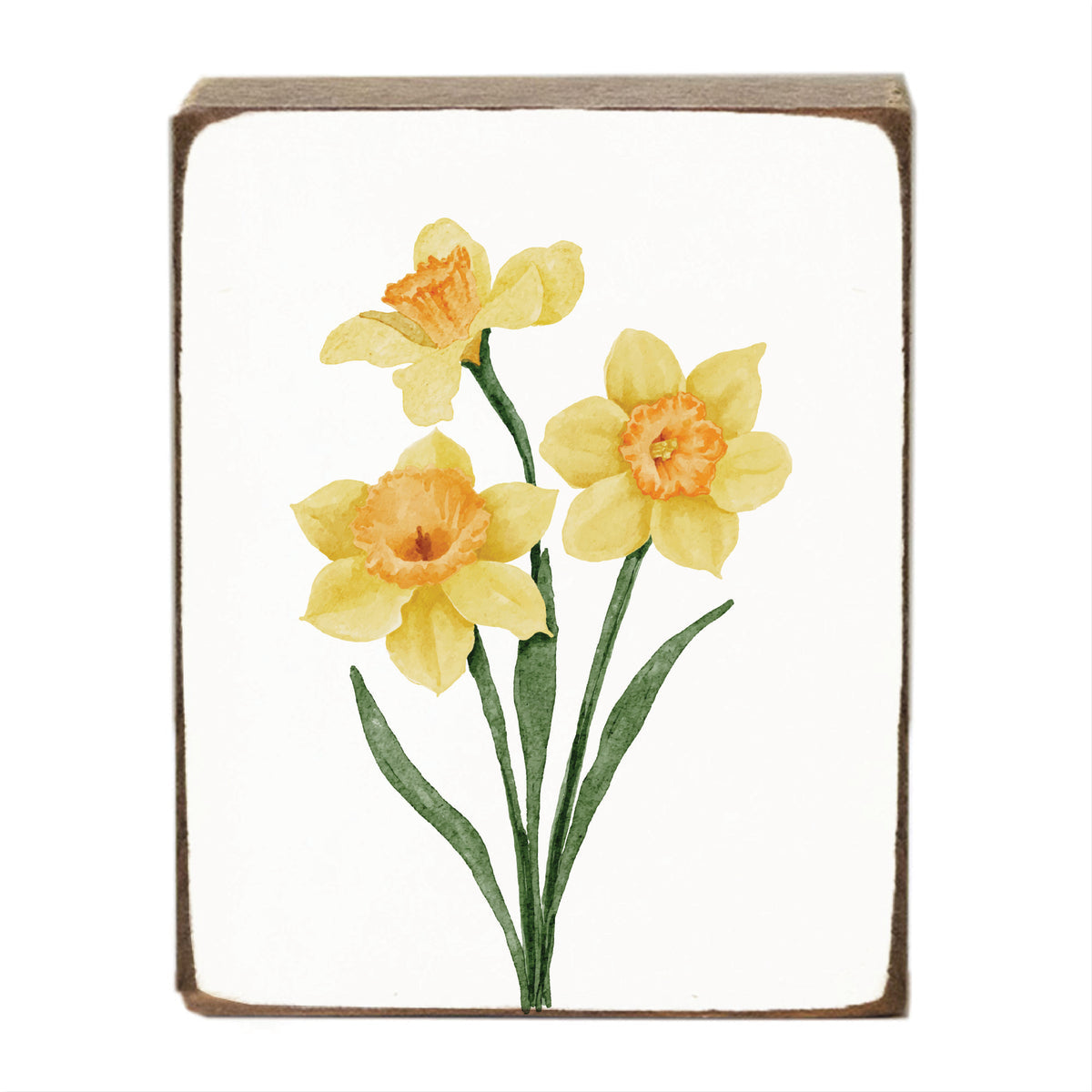 Decorative block with yellow daffodil flowers on a white background. Available at Be Charmed
