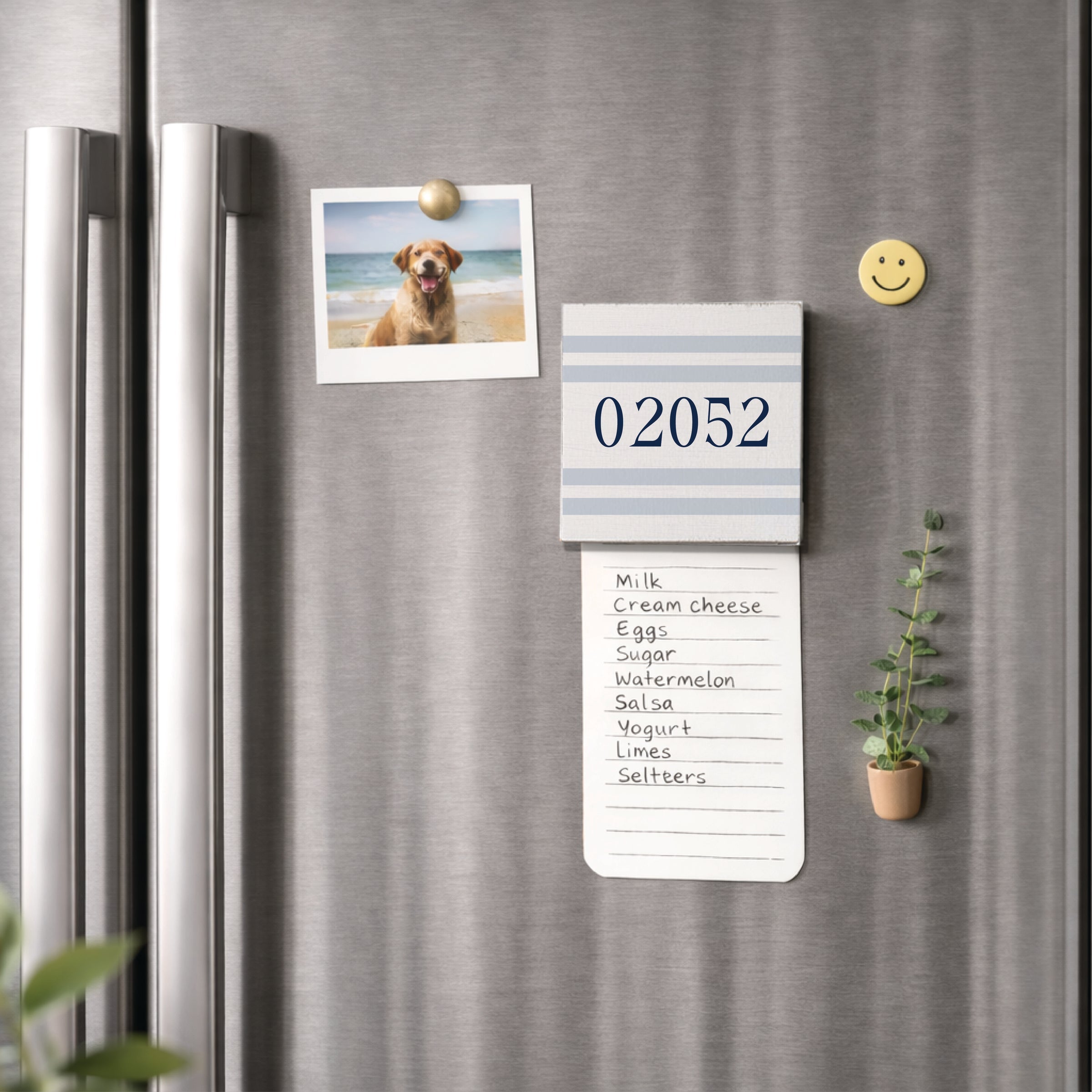 Fridge with a Rustic magnetic notepad, photo, and plant on a refrigerator. Available at Be Charmed
