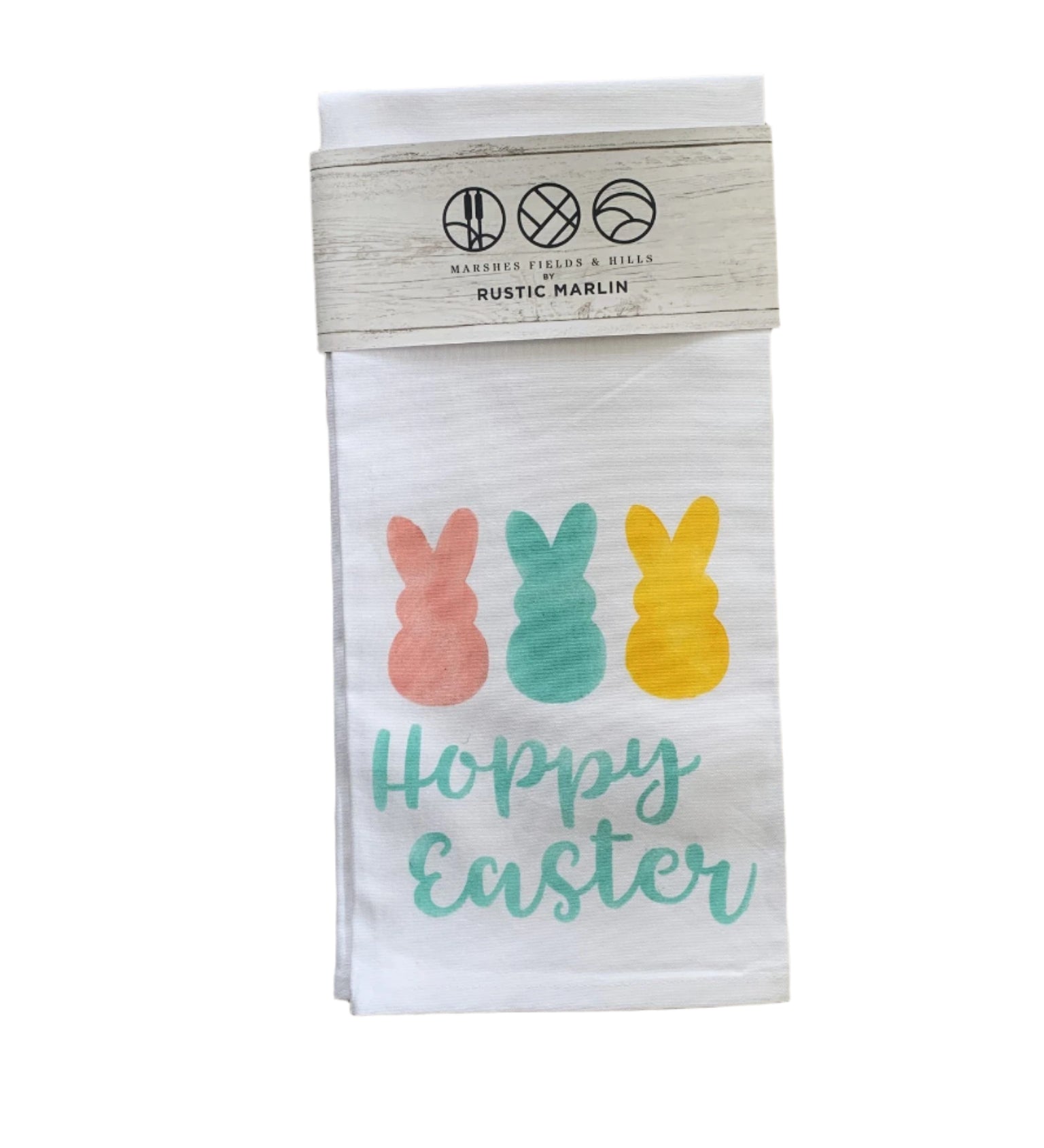 A rustic style tea towel with 'Happy Easter' text and decorative bunny illustrations in multicolor on a white background. Available at Be Charmed