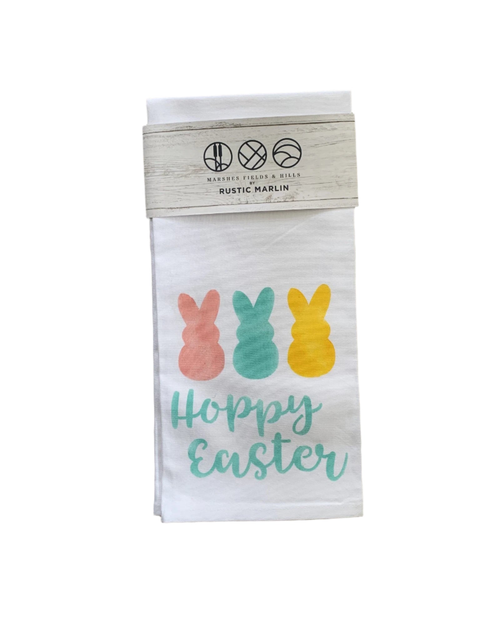 A rustic style tea towel with 'Happy Easter' text and decorative bunny illustrations in multicolor on a white background. Available at Be Charmed