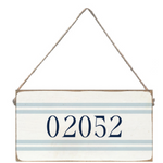 Rustic Marlin blue striped sign with numbers '02052' hanging on a white background. Available at Be Charmed