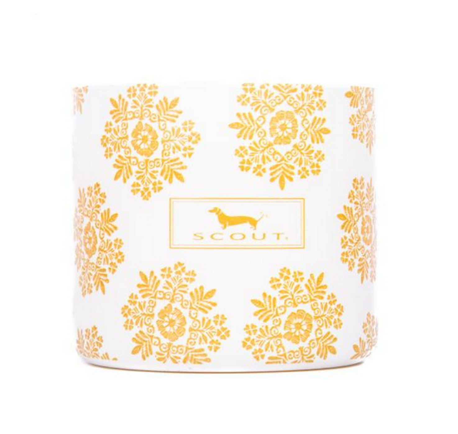 A white candle with a geometric pattern in gold, and the brand 'Scout' visible on the lid. Available at Be Charmed