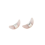Pair of silver and rose crescent moon earrings on a white background. Available at Be Charmed
