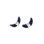 Pair of crescent moon stud earrings on a white background. Available at Be Charmed