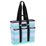 A striped Scout tote bag with multiple pockets and a black strap, featuring the Scout brand label. Available at Be Charmed