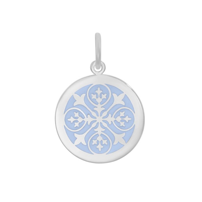 Round lavender pendant with floral design on a white  background. Available at Be Charmed