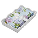 Set of floral guest towels with a white bow on a decorative tray. Available at Be Charmed