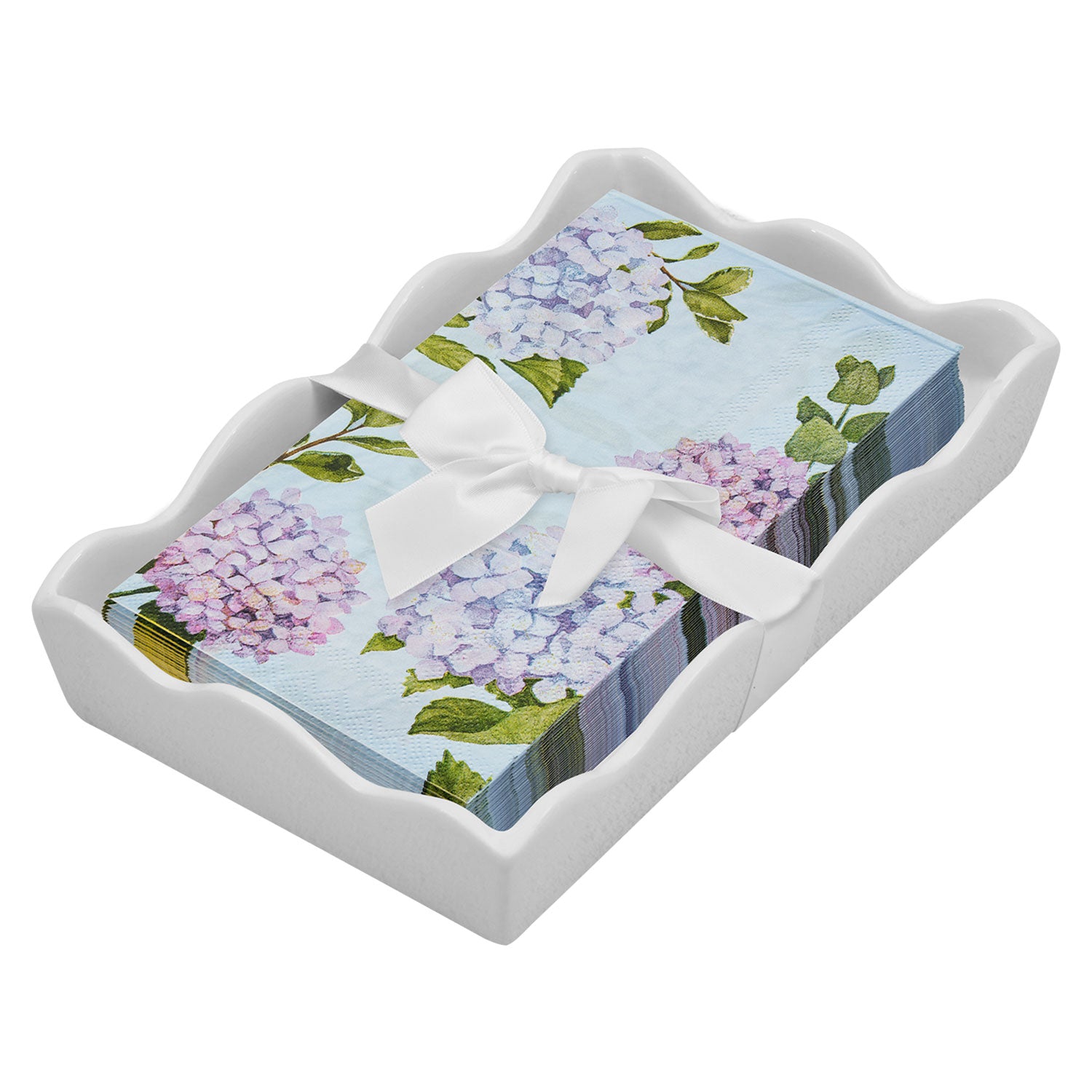 Set of floral guest towels with a white bow on a decorative tray. Available at Be Charmed