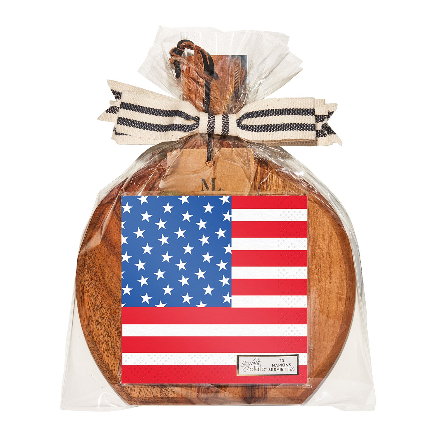 Wooden cutting board with American flag napkins and black and white striped bow on a white background. Available at Be Charmed