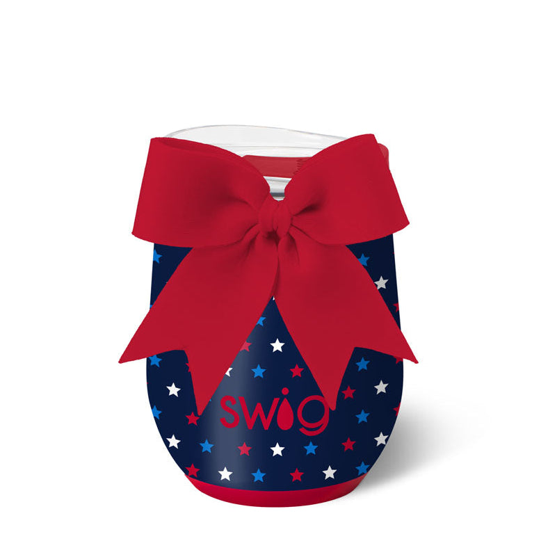 Swig tumbler with a red bow on a white background. Available at Be Charmed