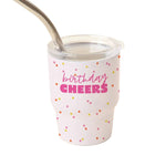 White tiny tumbler with colorful polka dots and 'birthday cheers' text on a white background. Available at Be Charmed