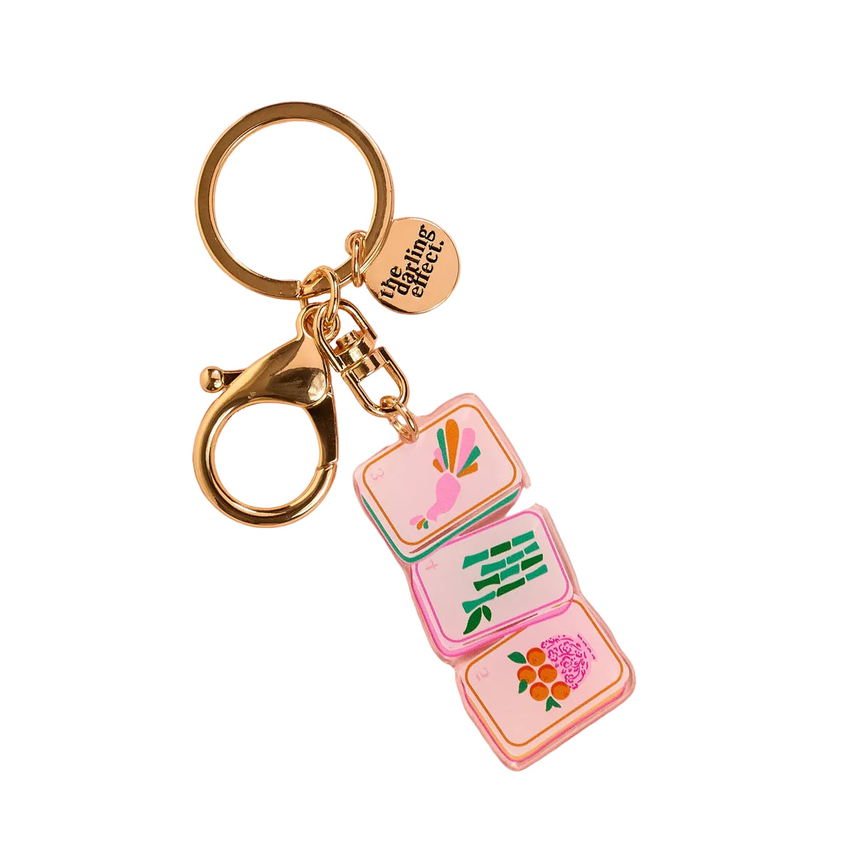 Keychain with square cmahjong tiles on a pink background. Available at Be Charmed
