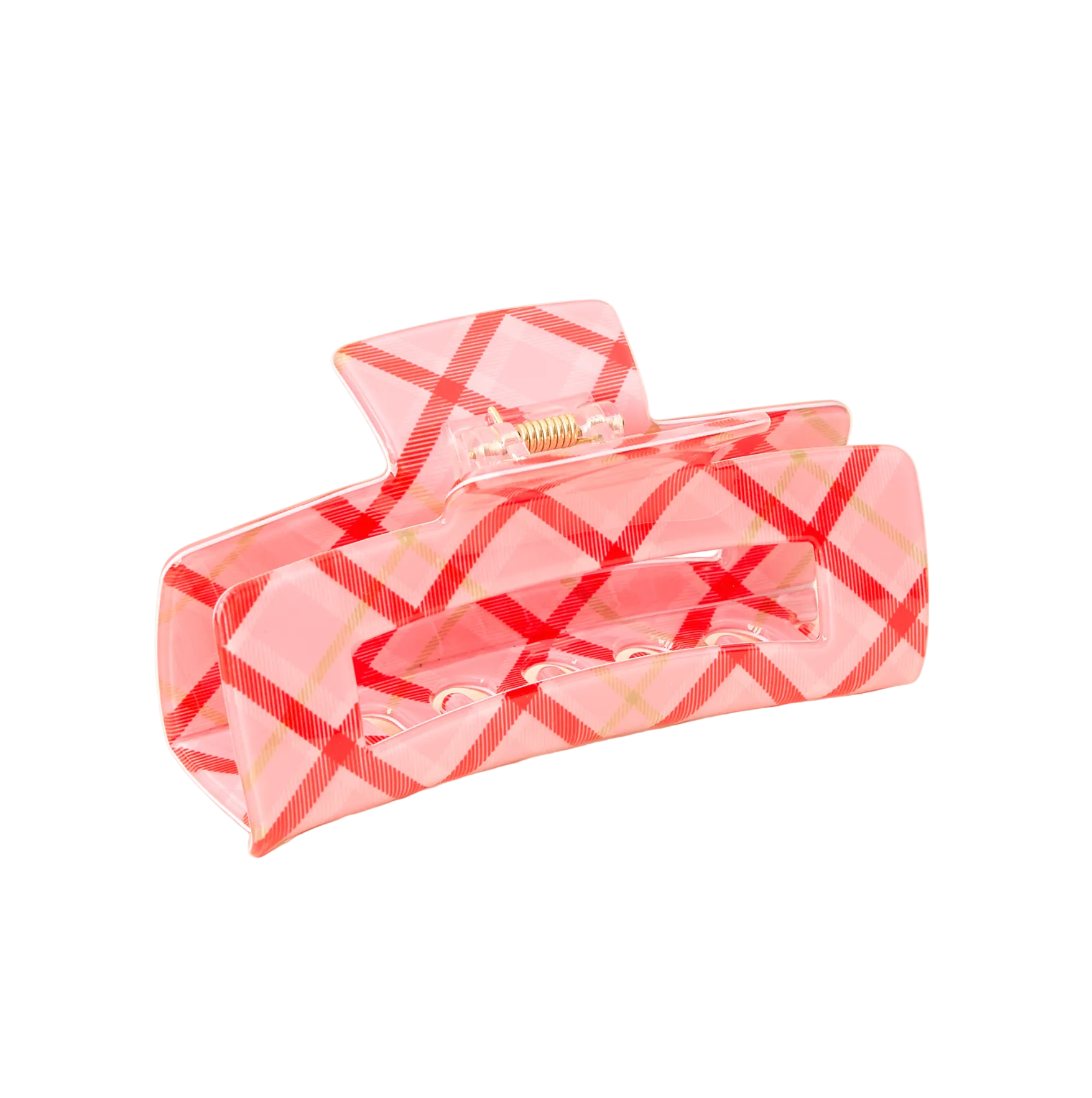 The darling effect pink checkered hair claw clip on a beige background. Available at Be charmed.