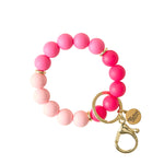 he Darling Effect Tickled Pink Hands-Free Keychain Wristlet available at Be Charmed