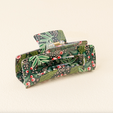 jolly sprig floral-patterned hair clips on a beige background. Available at Be Charmed. 