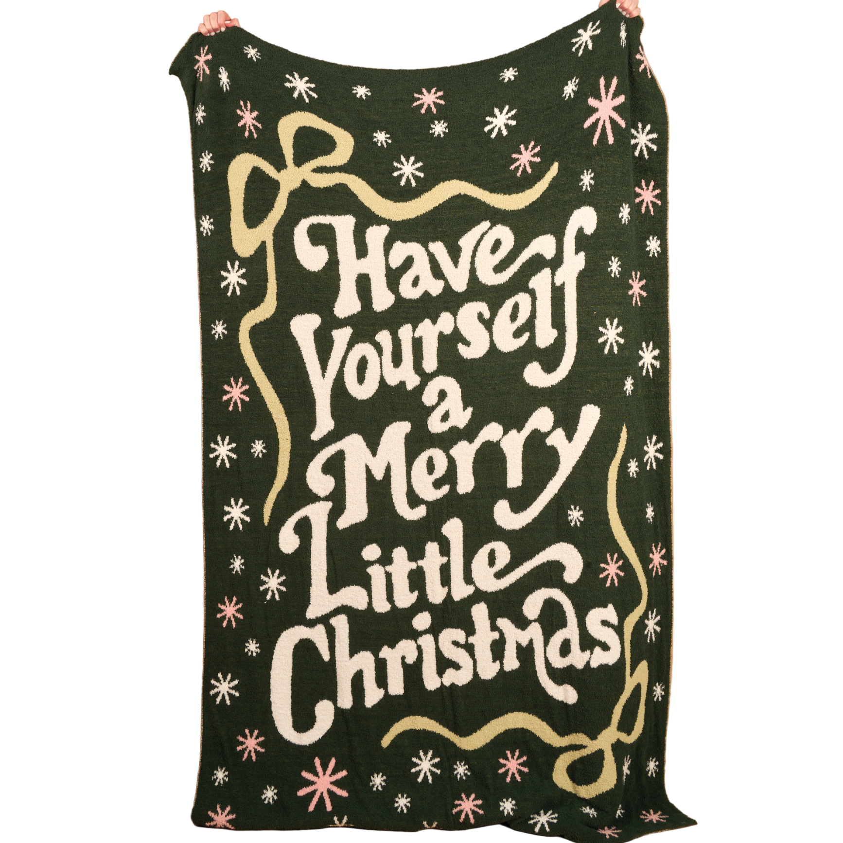 The Darling effect christmas-themed blanket with decorative text and patterns on a white background. Available at Be Charmed. 