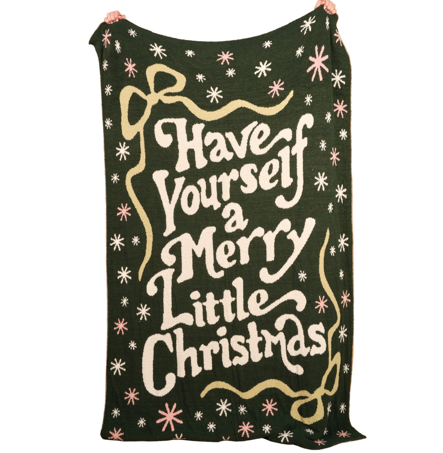 The Darling effect christmas-themed blanket with decorative text and patterns on a white background. Available at Be Charmed. 