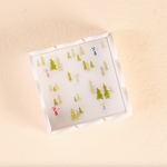 The Darling Effect Scallop Trinket Tray – Apres Ski design, chic scalloped tray for jewelry or décor. Available at Be Charmed.