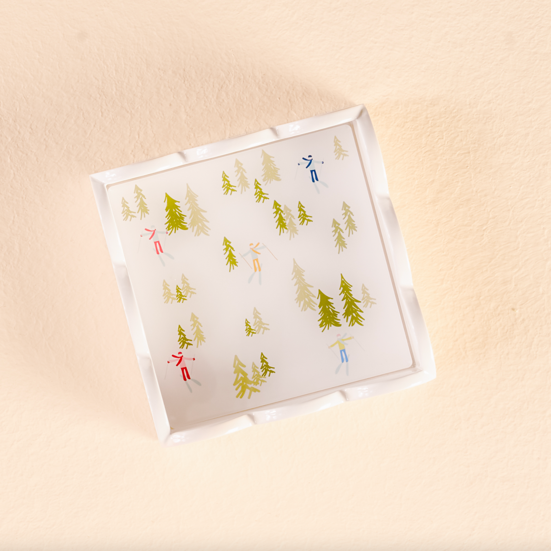 The Darling Effect Scallop Trinket Tray – Apres Ski design, chic scalloped tray for jewelry or décor. Available at Be Charmed.