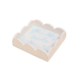 White scalloped edge box with blue  'bride' text on a white background. Available at Be Charmed