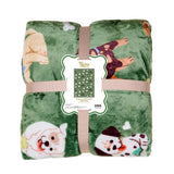 Folded green blanket with dogs on a white background. Available at Be Charmed