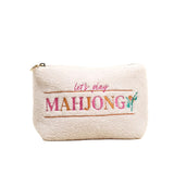 White pouch with 'let's play MAHJONG' text on a white background. Available at Be Charmed