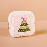 White textured cosmetic pouch with a Christmas tree design on a beige background. Available at Be Charmed.