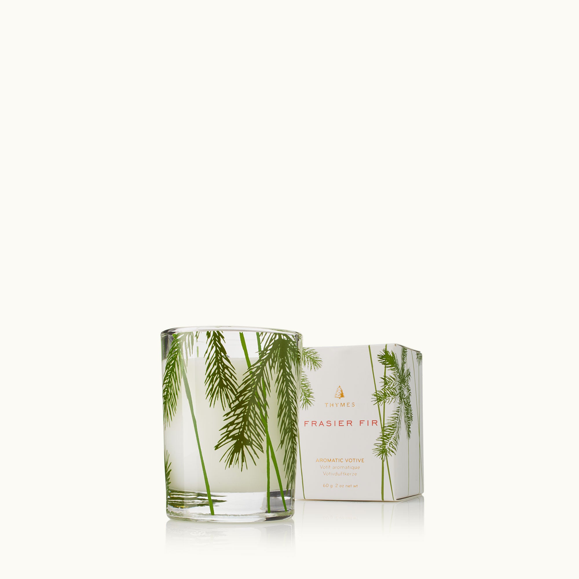 Thymes Frasier Fir Pine Needle Votive Candle with fresh evergreen holiday fragrance – Available at Be Charmed