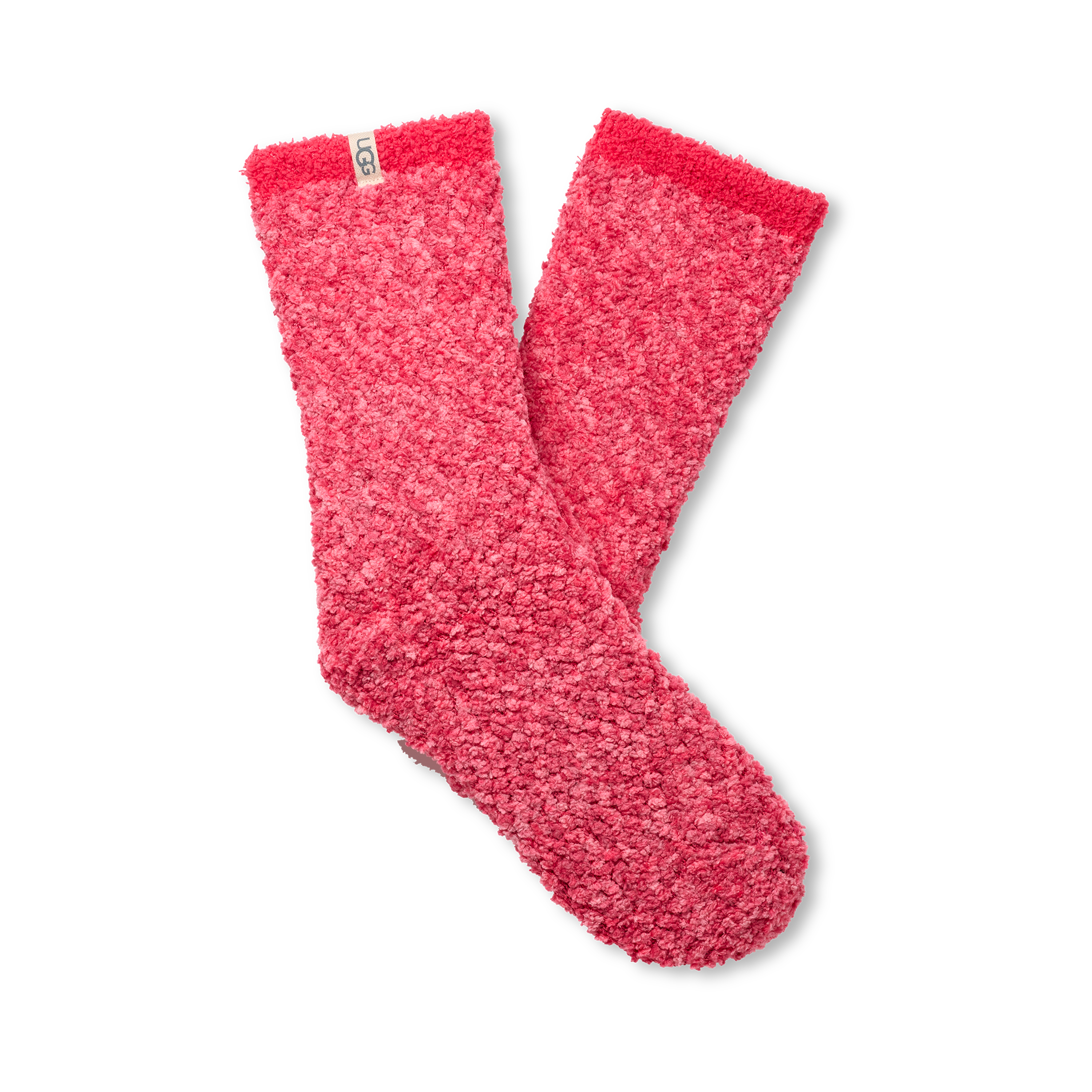 Pair of UGG pink fuzzy socks on a white background. Available at Be Charmed. 