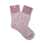 Pair of pink socks with ribbed texture on a white background. Available at Be Charmed