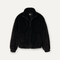 UGG Tash Faux Fur Jacket in Black – chic and cozy women’s outerwear with a modern silhouette. Available at Be Charmed. 