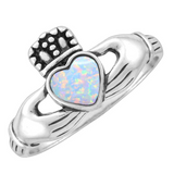Wheeler Sterling Silver Ring White Opal Claddagh featuring a traditional Irish design with a synthetic white opal centerpiece, available at Be Charmed.