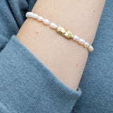 Scout Curated Wears Pearl Affirmation Bracelet in Luck and Gold available at Be Charmed.